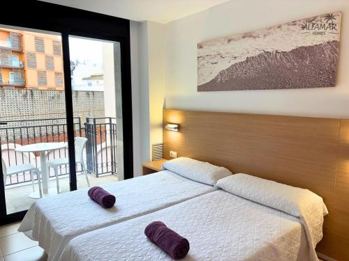 Katil atau katil-katil dalam bilik di Nagomi Suite - Modern Apartment with Parking & Swimming Pool