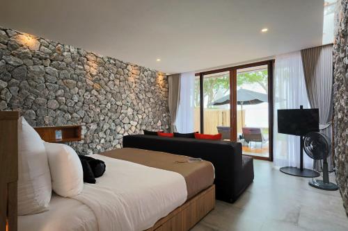 Postel nebo postele na pokoji v ubytování Tolani Resort Kui Buri