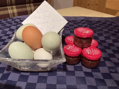 a box of eggs and chocolates on a table at Ferienwohnungen Bergblick in Immenstadt im Allgäu