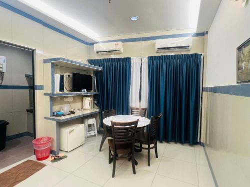TV o dispositivi per l'intrattenimento presso Burmahtel Hotel