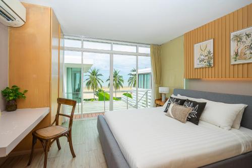 Postel nebo postele na pokoji v ubytování Tolani Le Bayburi Villas, Hua Hin - Pranburi