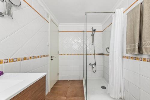 Ένα μπάνιο στο Apartamentos El Capricho