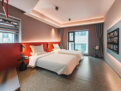 Voodi või voodid majutusasutuse 水磨沟区几里民宿店-JiLi Lodge toas