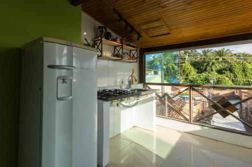 Η κουζίνα ή μικρή κουζίνα στο Pituba Vile - Apartamento Pituba