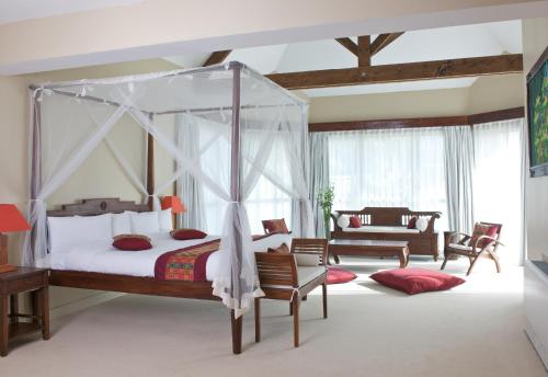 Llit o llits en una habitació de Les Jardins de Beauval