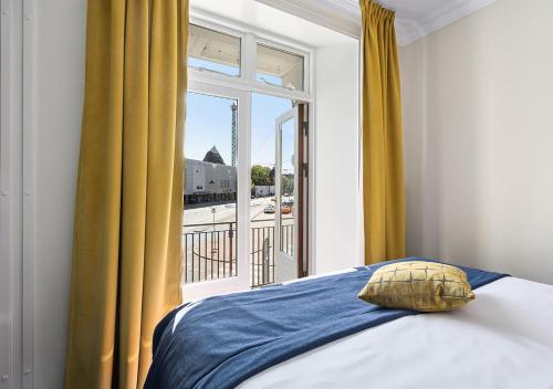 Ένα ή περισσότερα κρεβάτια σε δωμάτιο στο ProfilHotels Copenhagen Plaza
