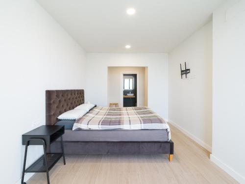 Ένα ή περισσότερα κρεβάτια σε δωμάτιο στο Sunset Beach Chalet