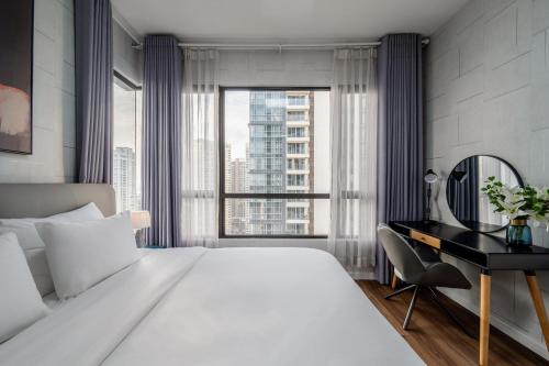 Ένα ή περισσότερα κρεβάτια σε δωμάτιο στο Estella Heights Luxury Apartment - Full Facilities