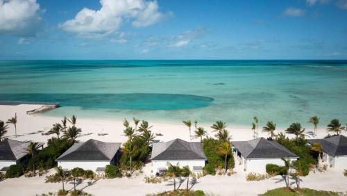 an aerial view of the beach at the excellence punta cana resort at Ambergris Cay - Private Island All-Inclusive in Big Ambergris Cay