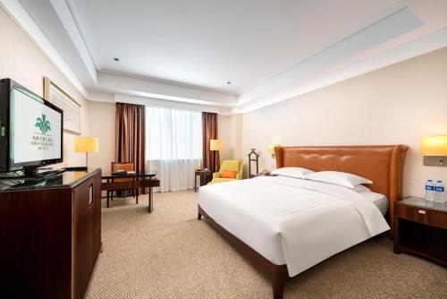 Harriway Garden Hotel Houjieにあるベッド
