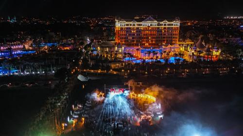 a view of a city at night with lights at Kamelya Aishen Club & Aqua Ultra All Inclusive Kids Concept in Side