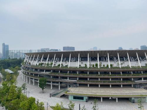 a large building with a roof with plants in it at Tokyu Stay Aoyama Premier in Tokyo