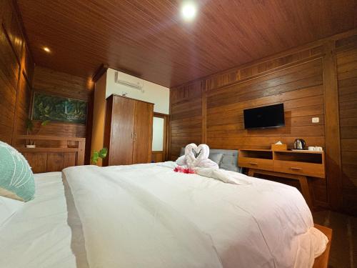 Ένα ή περισσότερα κρεβάτια σε δωμάτιο στο Astayana home