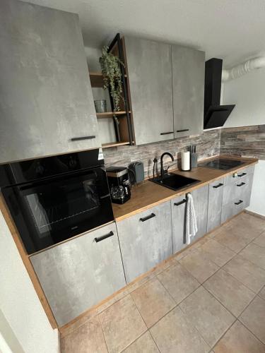 Dapur atau dapur kecil di Zum Weserstrand