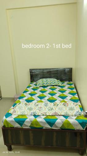 Postel nebo postele na pokoji v ubytování Sunshine Safeguard Homestay