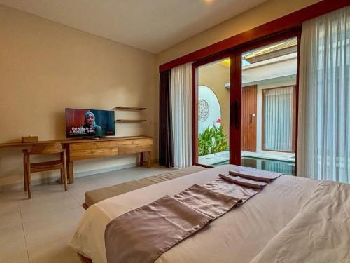 Televisyen dan/atau pusat hiburan di Solvana Villas Sanur by AGATA