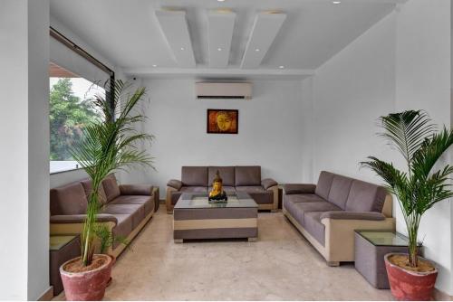 Un lugar para sentarse en Hotel Karma Inn Near Jaipur Exhibition and Convention Centre