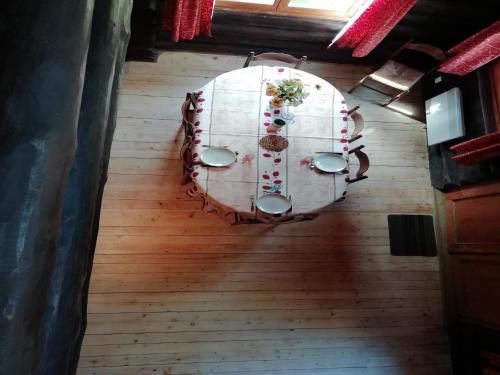 an overhead view of a table in a room at Charming Chalet with Swimming Pool in Quend in Quend