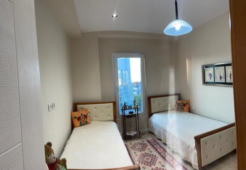 Postel nebo postele na pokoji v ubytování My Stay in Durres