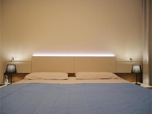 Giường trong phòng chung tại Venezia-Mestre Elite apartment BrosA