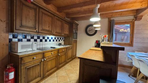 Η κουζίνα ή μικρή κουζίνα στο Chaleureux appartement 10pers Sainte-Foy-Station