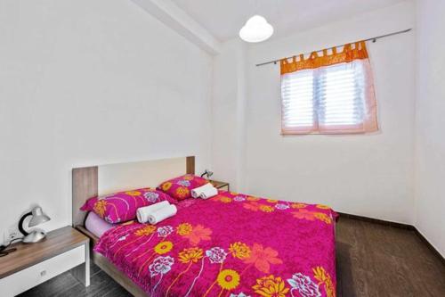 Katil atau katil-katil dalam bilik di Holiday Home Bene