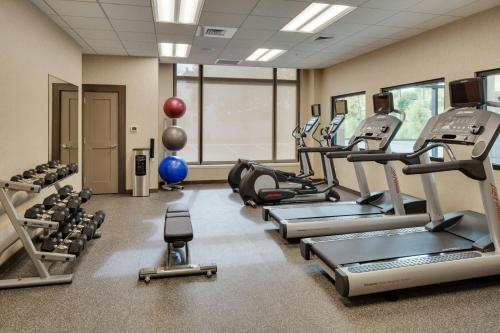 a gym with treadmills and cardio equipment in a room at Residence Inn by Marriott Bangor in Bangor