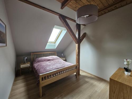Postel nebo postele na pokoji v ubytování Siedlisko Mazury II