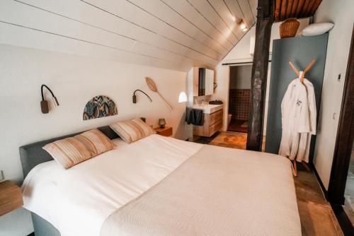 Cama o camas de una habitación en De Daler Deel