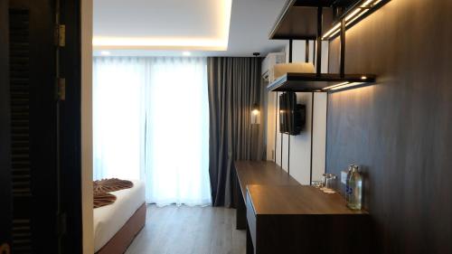 Postel nebo postele na pokoji v ubytování Andaman Lanta Resort - SHA Extra Plus