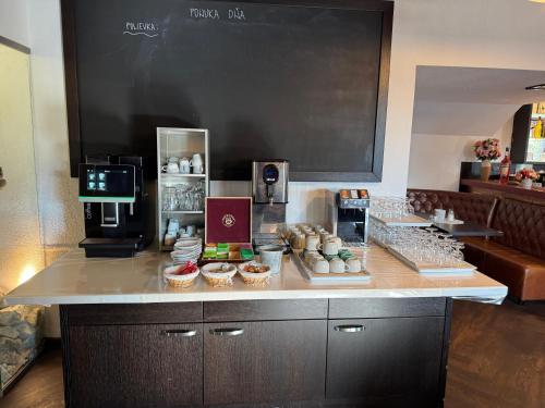 Kuchyň nebo kuchyňský kout v ubytování Apartmány Sport & Ski