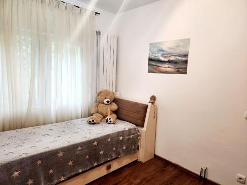 Ένα ή περισσότερα κρεβάτια σε δωμάτιο στο Sunny House