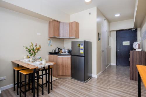 Kuchyň nebo kuchyňský kout v ubytování Virgo Nest Rentals - Avida Riala IT Park - City View
