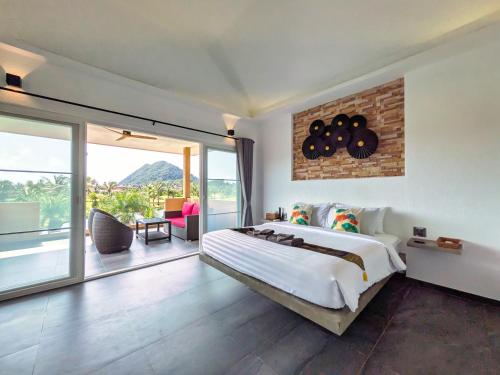 Postel nebo postele na pokoji v ubytování Ha Sip Ha Villa Rooms - by KohChangVillas