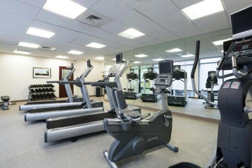 a gym with treadmills and elliptical machines at SpringHill Suites Indianapolis Fishers in Indianapolis