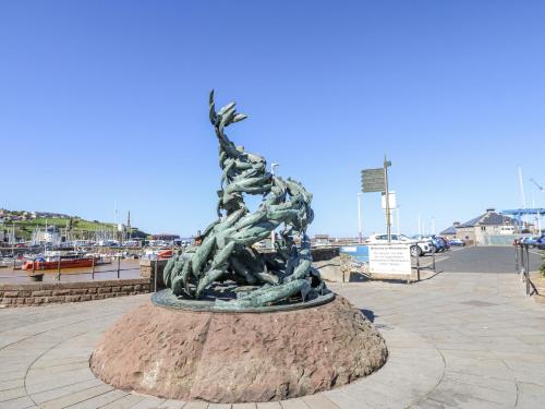 a statue in the middle of a pier at Lowther House in Whitehaven