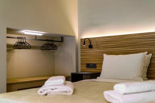 Ένα ή περισσότερα κρεβάτια σε δωμάτιο στο Bliss Luxury Apartments