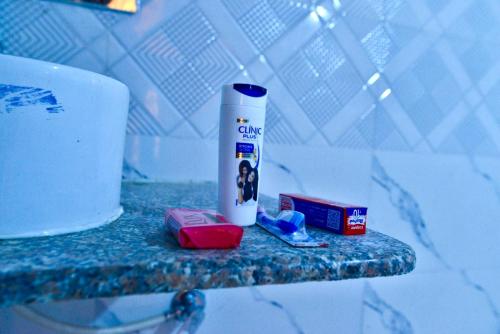 a tube of toothpaste on a counter in a bathroom at Melody Moon Desert Camp & Resort in Jaisalmer