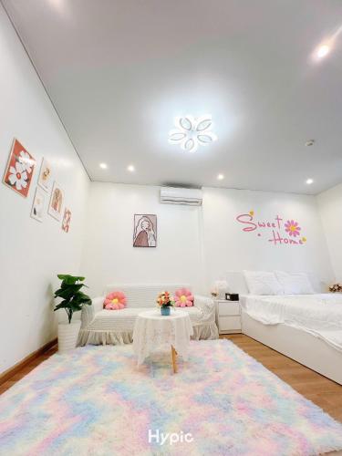 Ένα ή περισσότερα κρεβάτια σε δωμάτιο στο Bai Chay Apartment