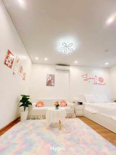 Ένα ή περισσότερα κρεβάτια σε δωμάτιο στο Bai Chay Apartment