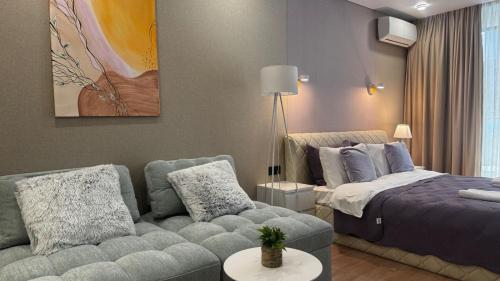 Cama o camas de una habitación en Sunset Studio Apartment