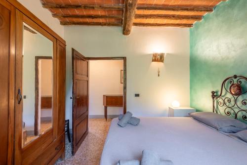Una cama o camas en una habitación de Podere La Speranza