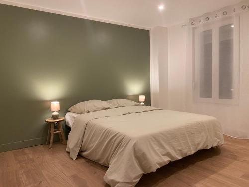 Llit o llits en una habitació de Maison Cosy