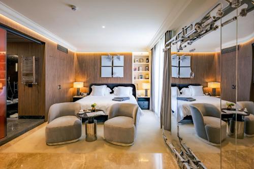 The First Dolce - Preferred Hotels & Resortsにあるベッド