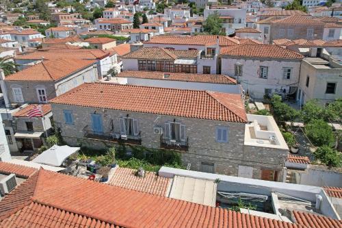 an aerial view of a town with red roofs at Amaryllis apartment in Hydra