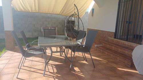 Φωτογραφία από το άλμπουμ του Casa con jardin privado en primera linea de playa σε Chipiona