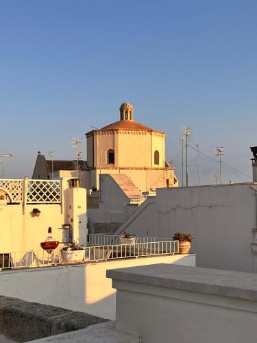 a view of a building from a rooftop at Il Nido tra le Mura Polignano in Polignano a Mare