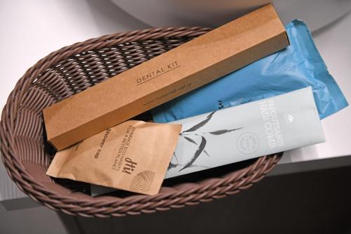 a wicker basket filled with different types of boxes at Amaryllis apartment in Hydra