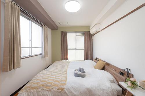 Clear Sky Guesthouse 305 Direct to Narita Airport, 8-minute walk from Kinshicho Station, within walking distance of Asakusa and Clear Sky Tower, 50 minutes to Disneyland, 1 minute to the mall