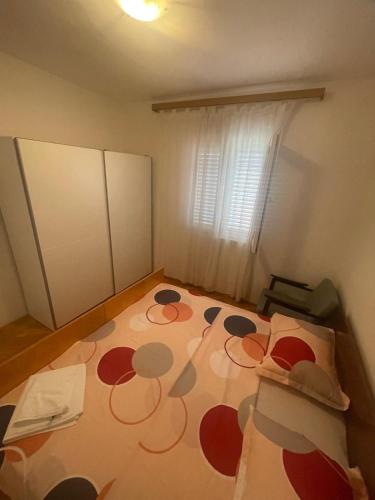 Postel nebo postele na pokoji v ubytování Ivica House
